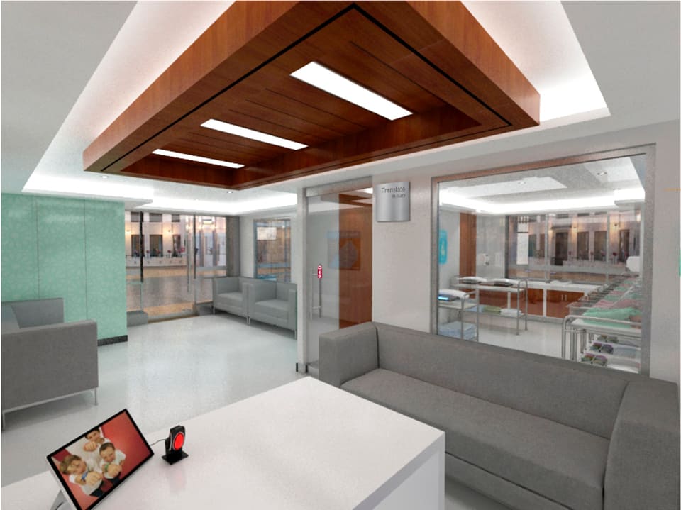 Interior of a banking branch customer hall with a warm timber-clad recessed ceiling raft, recessed linear lighting, full-height glazed partitions separating teller and service zones, polished light-toned floors, and grey upholstered waiting seating beside a white stone-topped counter with a tablet sign-in point.